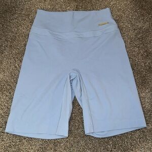 Whitney Simmons sky blue cycling shorts